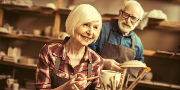 Community activities for seniors includes painting classes, which this image shows.